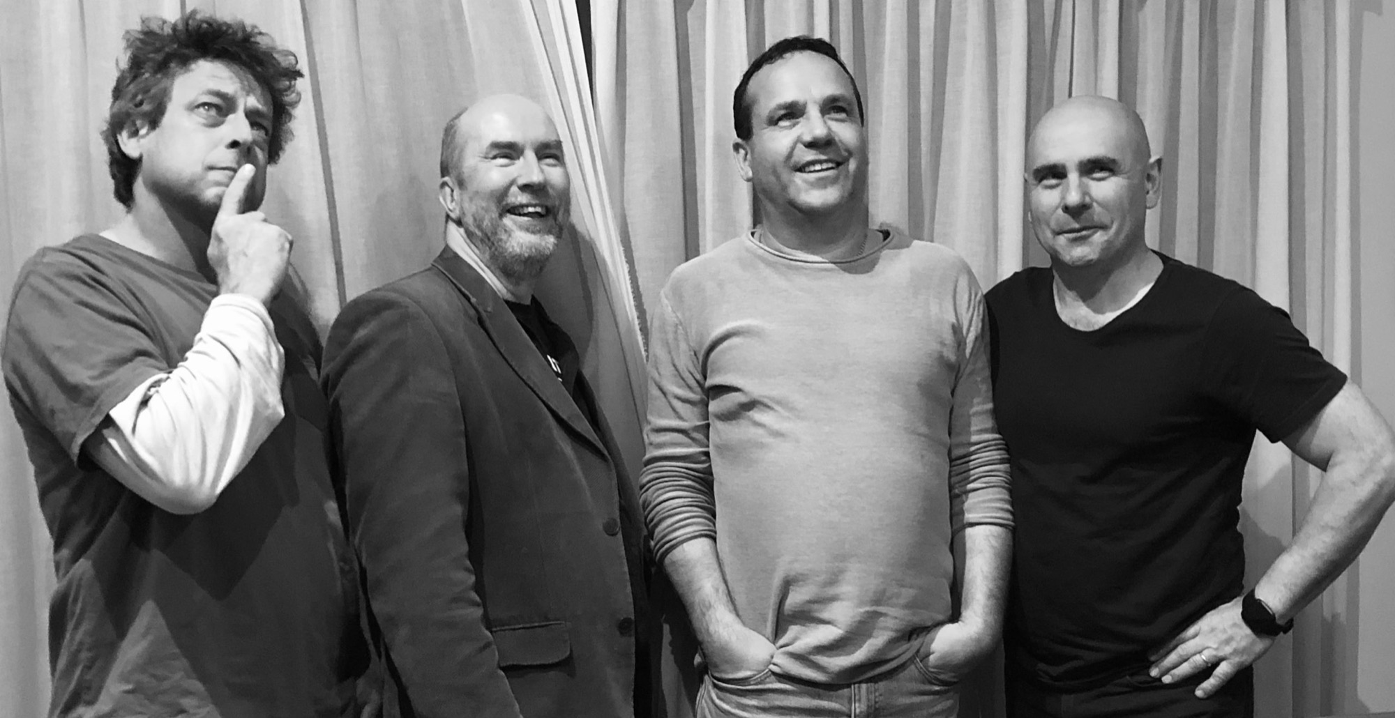 Black and white portrait of Jay Harvey, Peter Thompson, Peter Byrne and Ron Wenzler